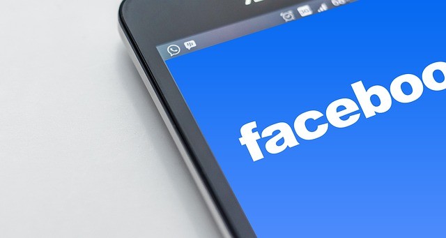 Facebook logo on a mobile phone